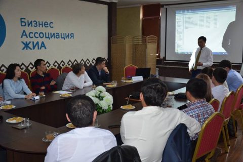 Group of people attending a business association meeting in Bishkek, Kyrgyzstan.