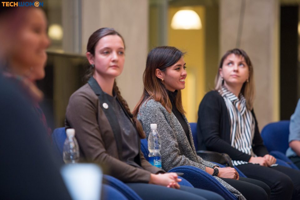 Attendees at a tech event in Bishkek, Kyrgyzstan, listening attentively.