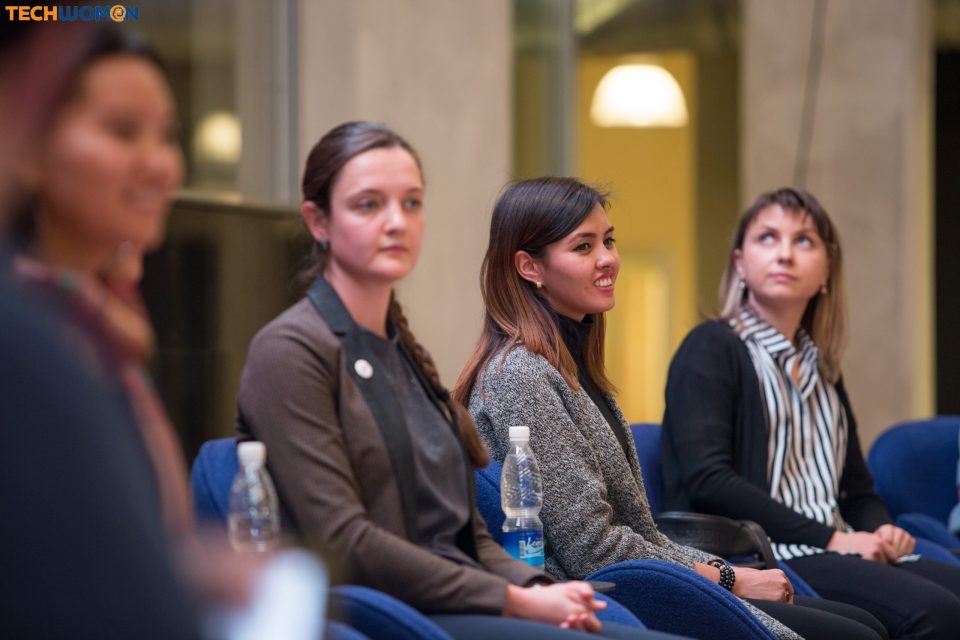 Attendees at a tech event in Bishkek, Kyrgyzstan, listening attentively.
