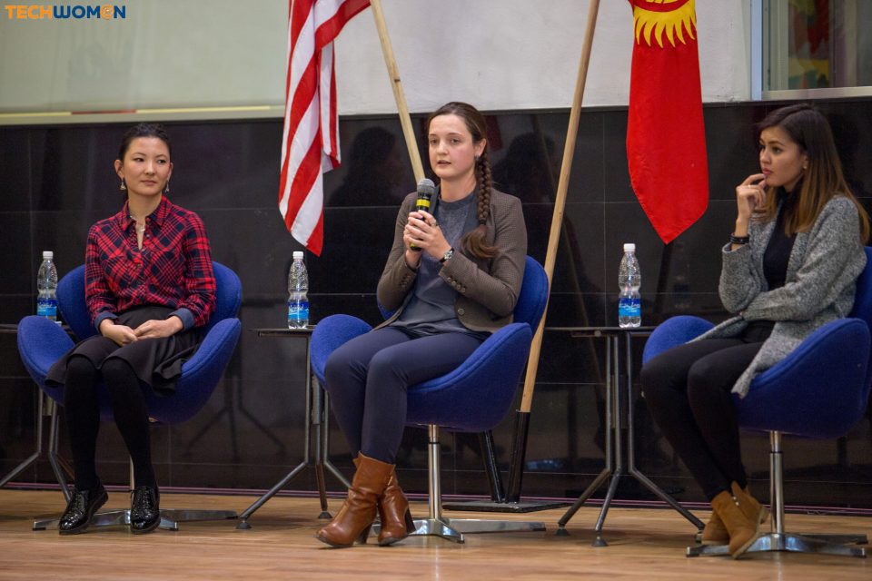 Three women seated on stage during a panel discussion at an event organized by KG Labs Foundation in Bishkek, Kyrgyzstan.