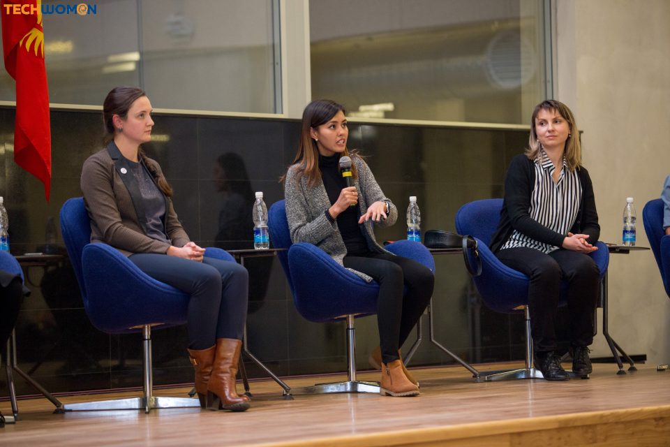 Three women seated on a stage during a panel discussion at KG Labs Foundation event in Bishkek, Kyrgyzstan.