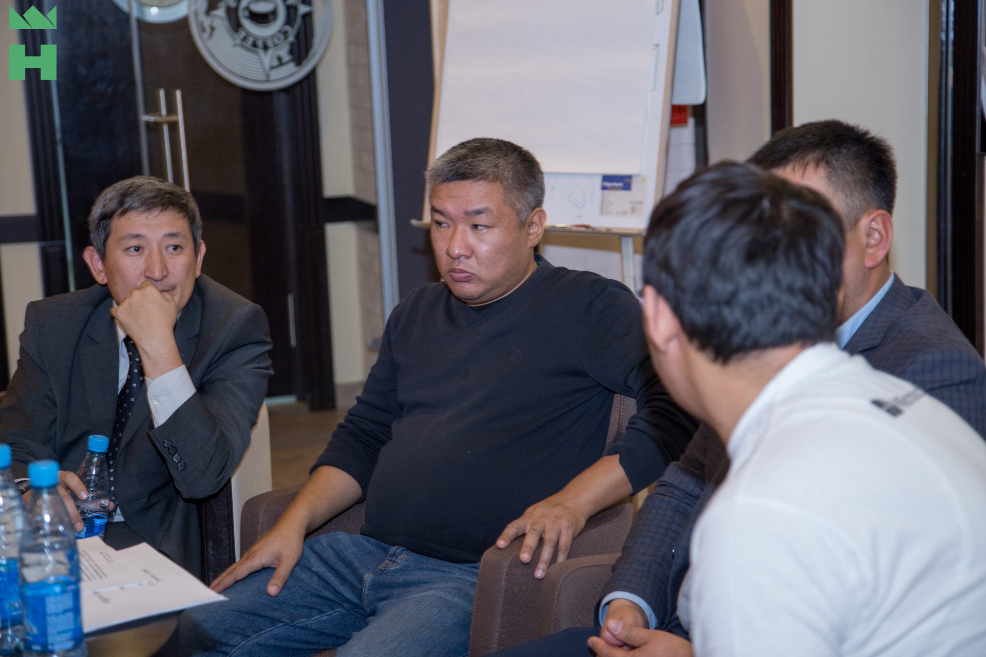 Participants in a meeting or workshop at KG Labs Foundation in Bishkek, Kyrgyzstan.