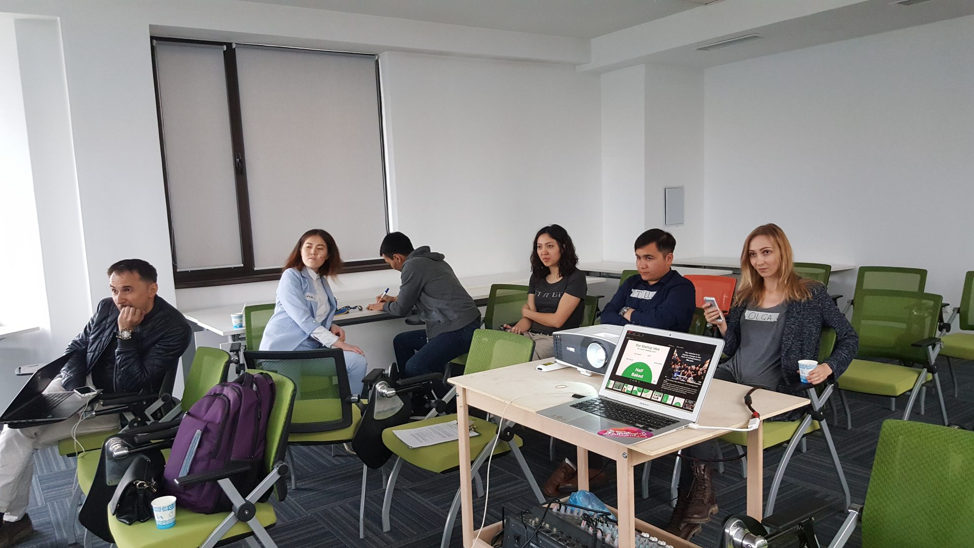 Participants in a workshop or training session in a classroom setting at KG Labs Foundation in Bishkek, Kyrgyzstan.