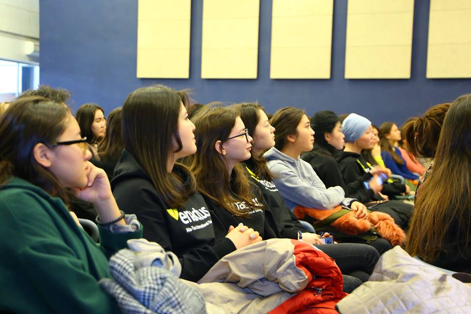 Participants in the Creative Spark program listen attentively during a meeting in Bishkek, Kyrgyzstan.