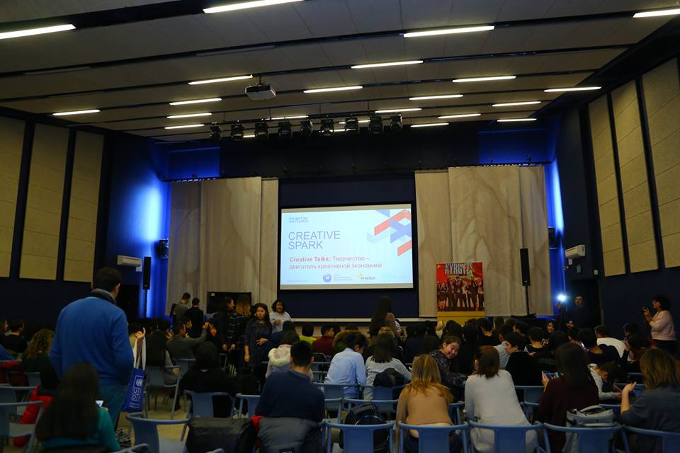 Participants attend a Creative Talks event focused on the creative economy in Bishkek, Kyrgyzstan.