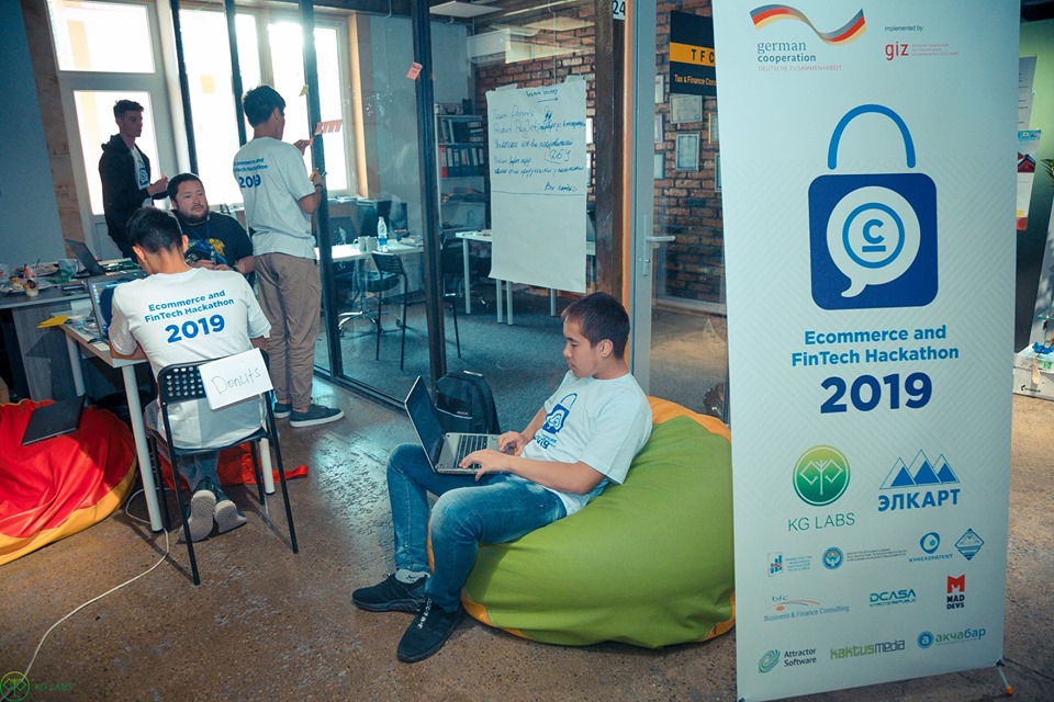 Participants working on projects at the Ecommerce and Fintech Hackathon 2019 in Bishkek, Kyrgyzstan.