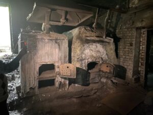The two basement coal stoves at School №7 named after Tagai Tashmamatov, Kara-Dyikan, Uzgen district. The smoke and soot were finding their way into the staff room and the classrooms above.